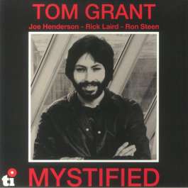 Mystified Grant Tom